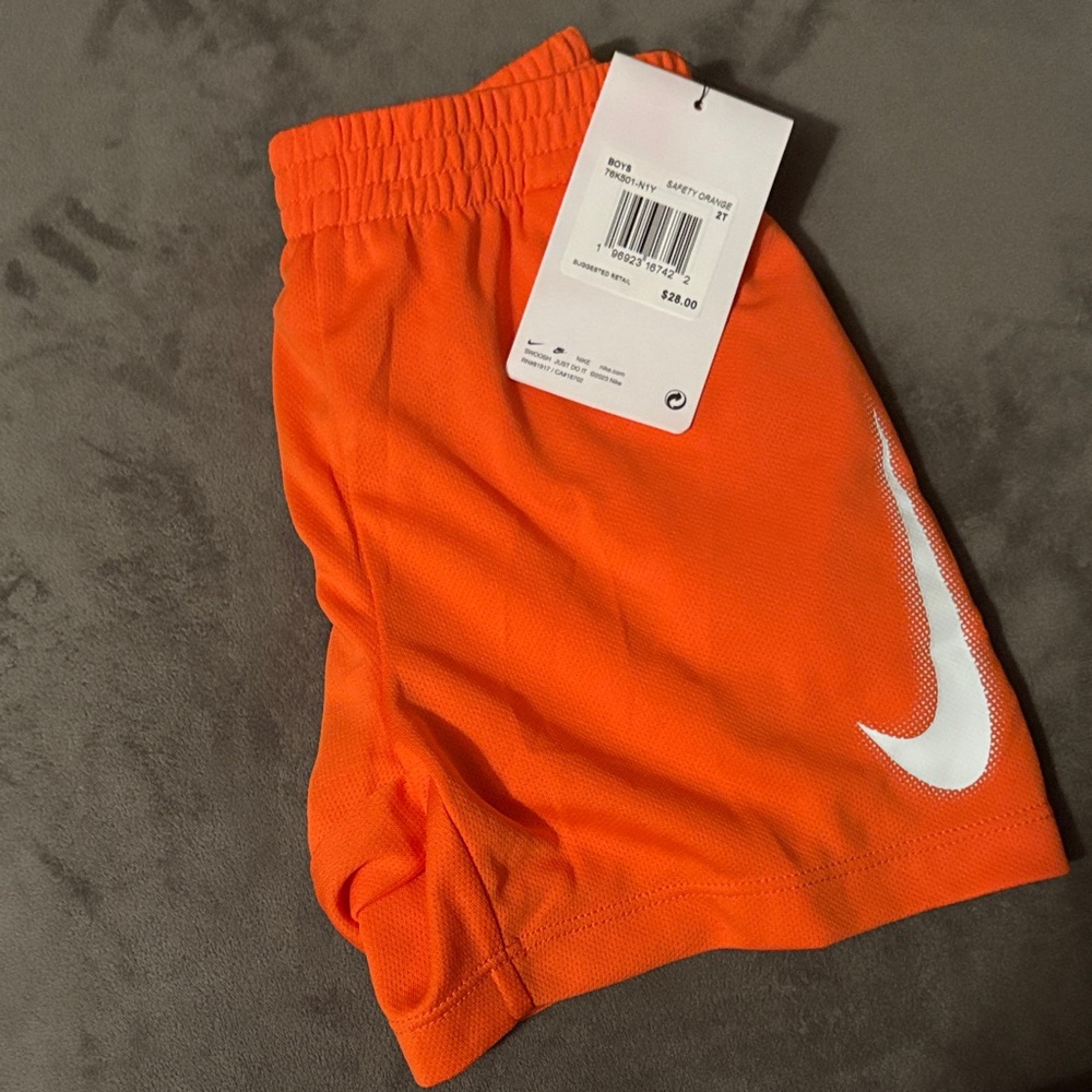 Nike Kids Orange Athletic Shorts with White Swoosh